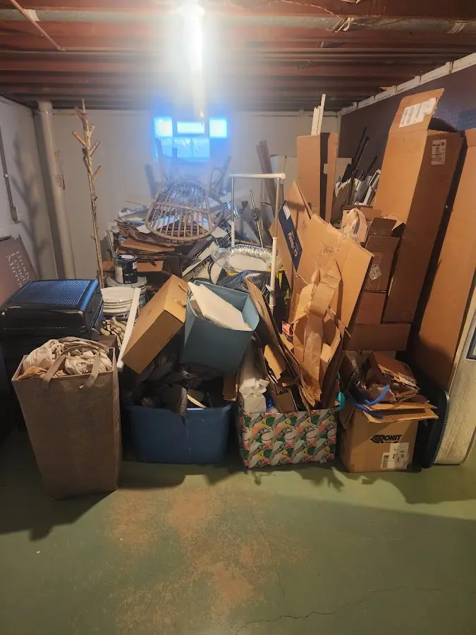 Roll-off dumpster container at job site for Construction Dumpster Rental in Midway